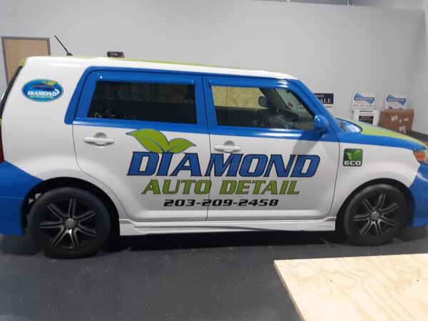 Vehicle wraps on Diamond car installed by Paragon Signs and Graphics in Connecticut