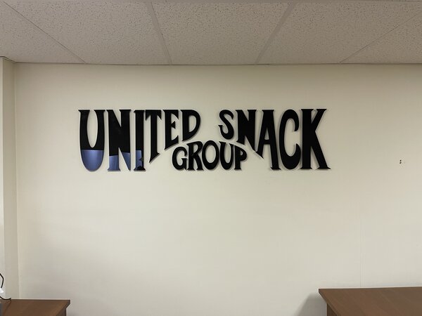 Acrylic sign of United Snack Group installed by Paragon Signs and Graphics in Connecticut