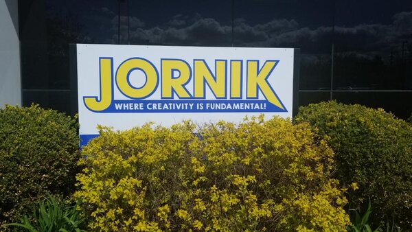 Custom brand panel sign for Jornik made by CT Sign Company