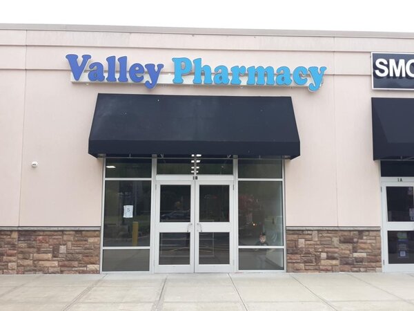 Custom storefront sign for Valley Pharmacy business made by Connecticut Sign Company