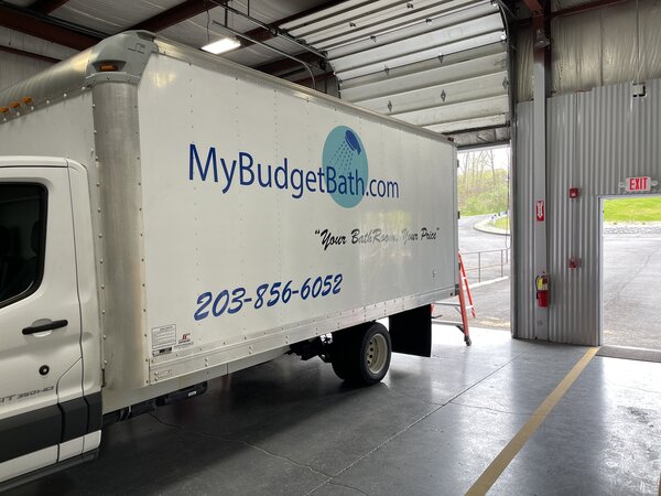 Custom vehicle wraps on My budget bath vehicle Installed by Connecticut Signs & Graphics