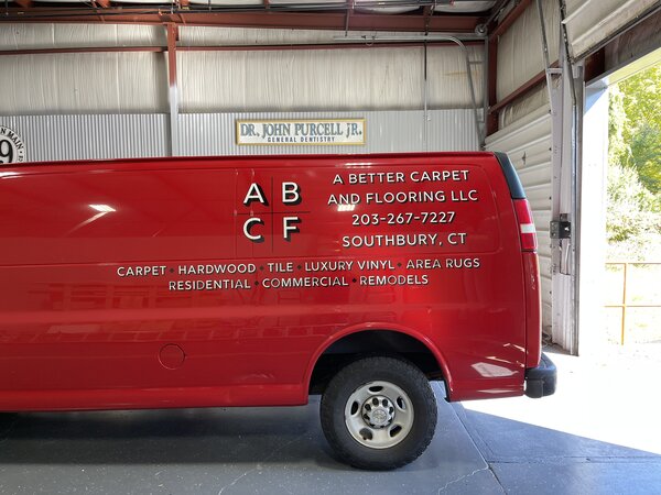 Custom graphics on Carpet and Floring LLC van by Connecticut Sign Company