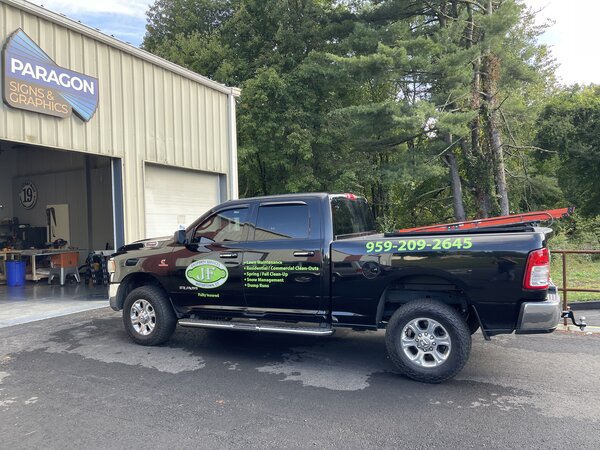 Installing vehicle graphics on trailer in CT