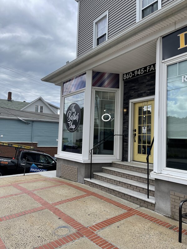 Storefront window graphics for The Baber Shop made by Connecticut Sign Company